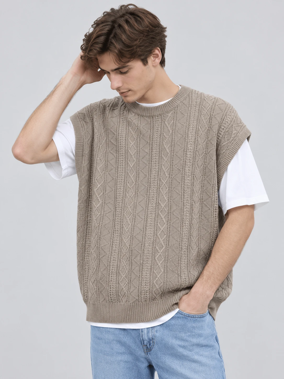 Taupe crew-neck knit vest with vertical cable panels and diamond textures