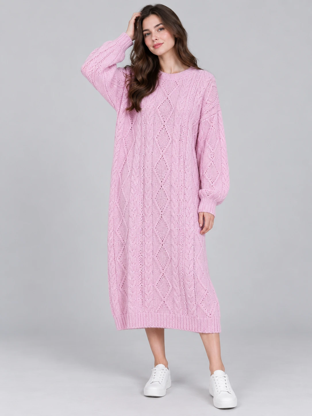Pink long-sleeve knit dress with vertical cable panels and openwork texture